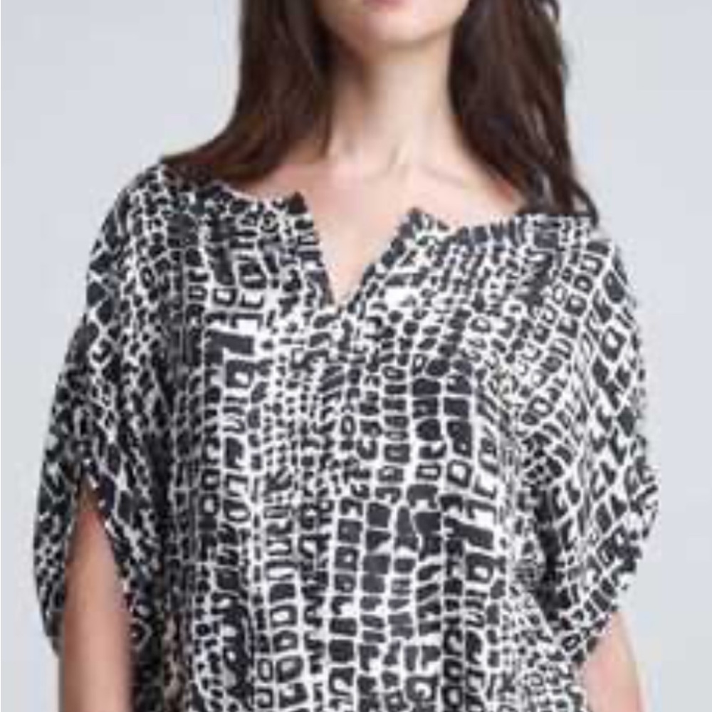 Rachel Zoe 100% silk leopard print blouse.